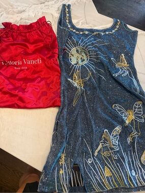 Vittoria Vaneti Shimmering Blue Garment with Metallic Accents